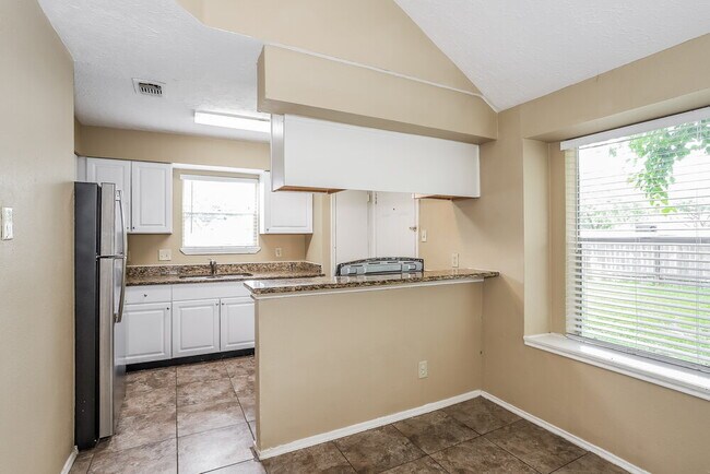 Foto del edificio - 6042 Beaconridge Dr