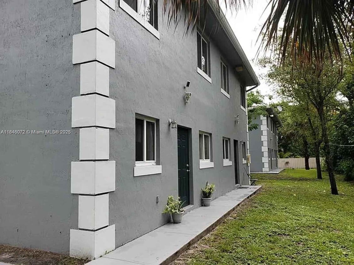 Photo - 14000 Northeast 2nd Avenue, Miami, FL 33161 - 4 BR 2 BA townhouse