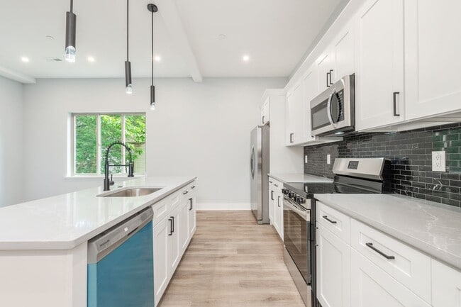 Building Photo - New 2 Bedroom Apartment in Modern Building! Now Offering 1 Month FREE on a 12 month lease!