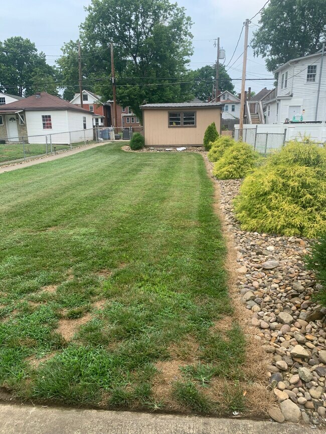 Fenced in Backyard. Beautiful Landscaping! - 842 12th Ave