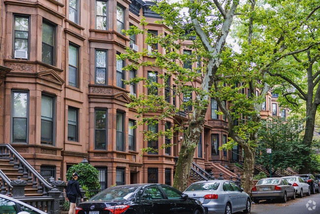 Quiet, tree-lined streets are lined with well-preserved brownstones in Park Slope.