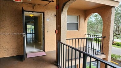 Building Photo - 2700 Coral Springs Dr