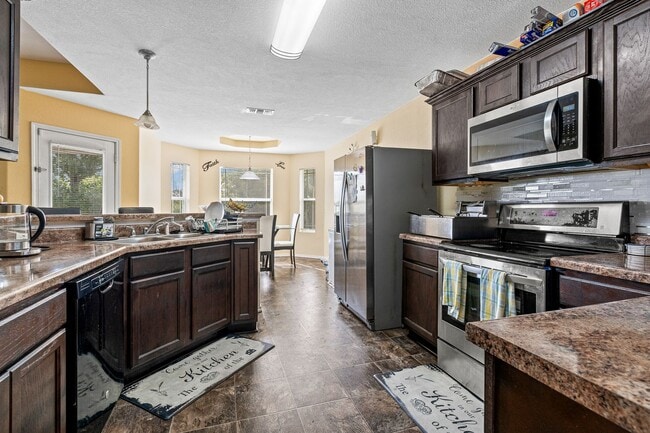 Building Photo - NEW IN MANAGEMENT - COMING SOON!