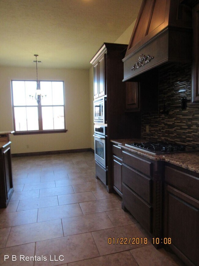 Foto del edificio - 4 br, 2.5 bath House - 1602 NE Blue Sage Lane