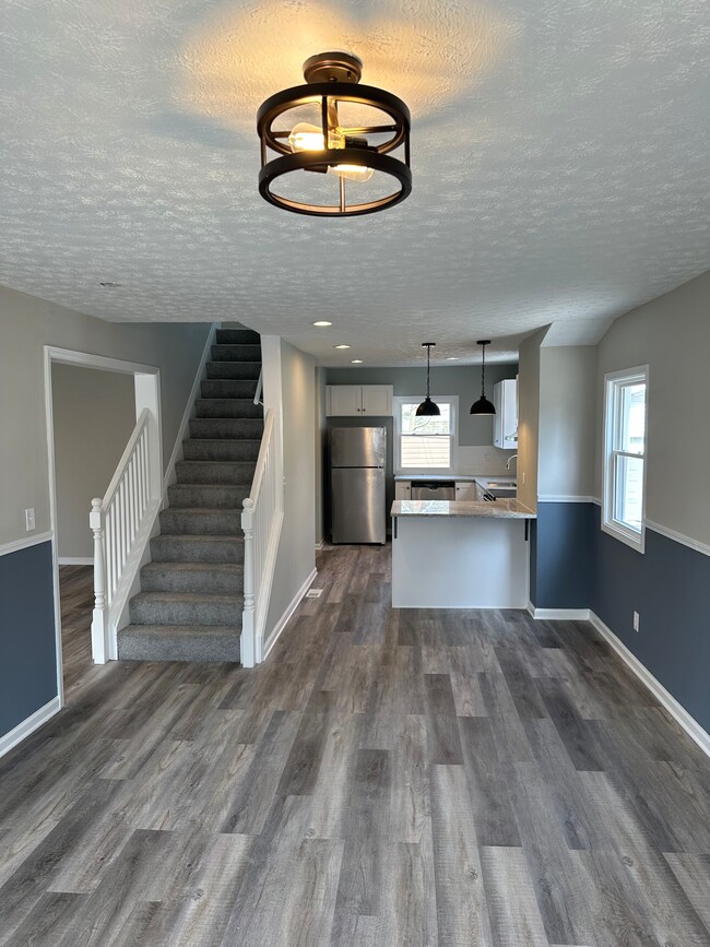 Open floor layout conveniently combines kitchen and dining room space - 3521 Nordway Rd