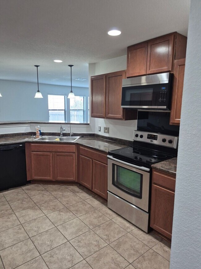 Foto del edificio - 8917 Lonesome Oak Drive