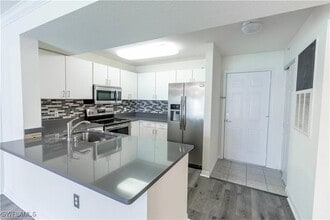 Building Photo - 8234 Key Royal Cir