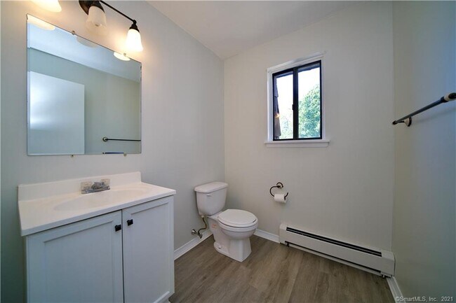 Half bathroom out of living area - 317 High Path Rd