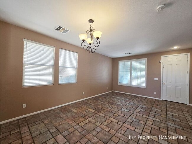 Building Photo - 10865 Wallflower Ave