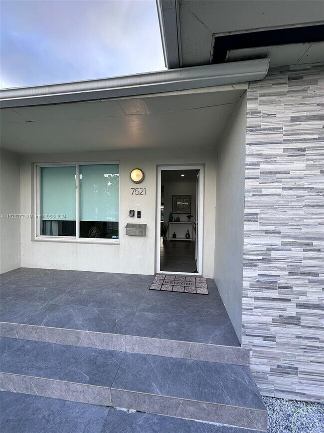 Building Photo - 7135 Collins Ave
