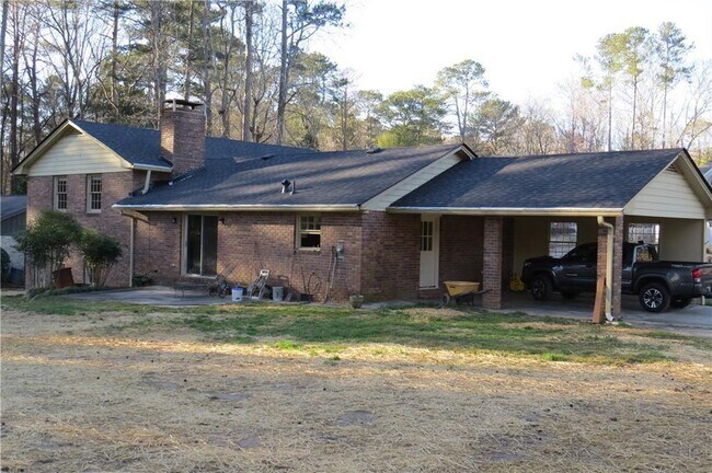 Foto del edificio - 3100 Garden Ln Dr