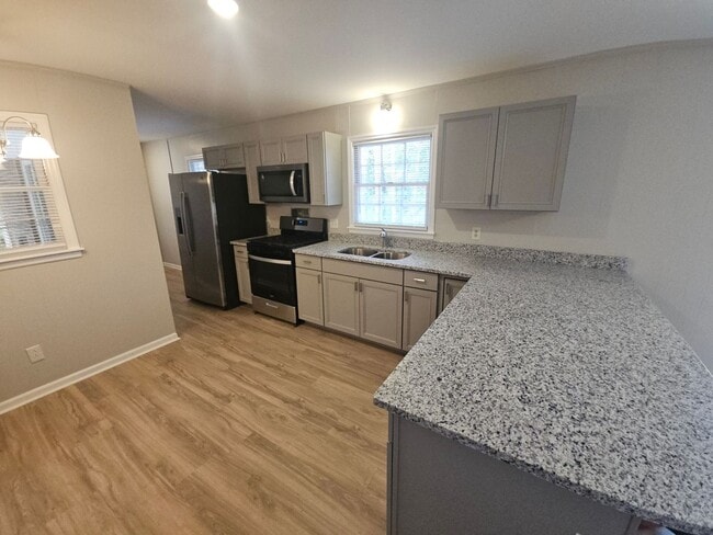 Building Photo - Renovated Classic - Upscale Brick Ranch on Basement