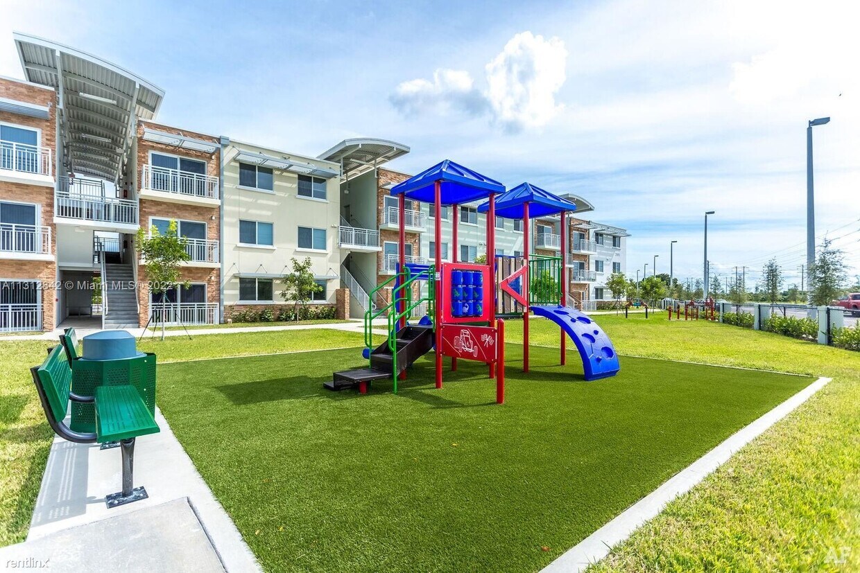 Building Photo - 2 br, 2 bath Condo - 25011 SW 130th Ave # ...