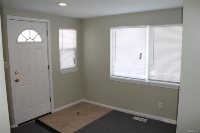 Building Photo - 56733 Grand River Ave