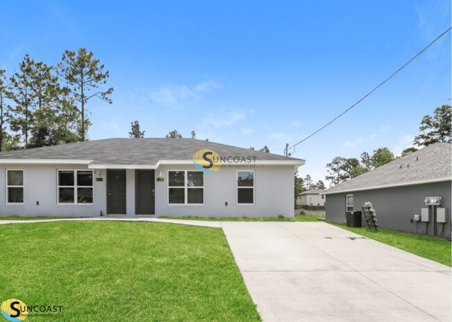 Foto del edificio - 9313 N Travis Dr