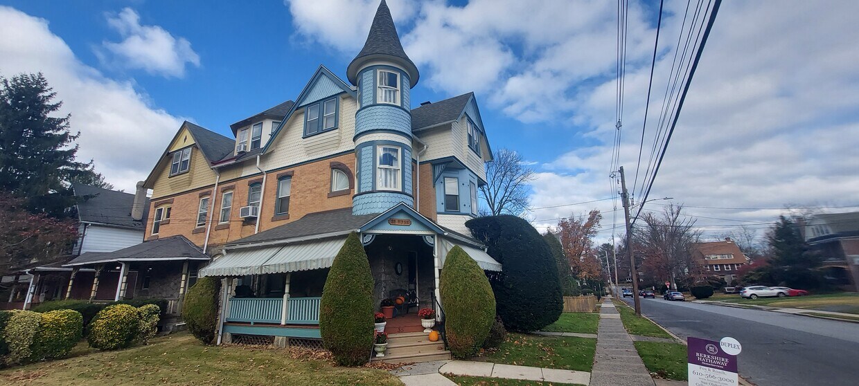 Large front yard and beautiful wrap around porch - 35 W La Crosse Ave