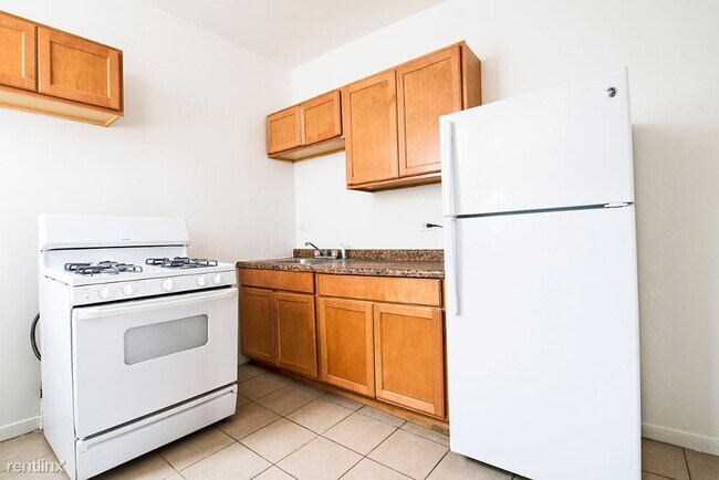 Foto del edificio - 2 br, 1 bath Apartment - 7930 S Ingleside Ave