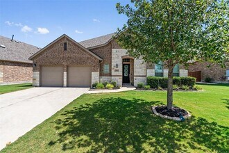 Building Photo - 404 Miracle Rose Way
