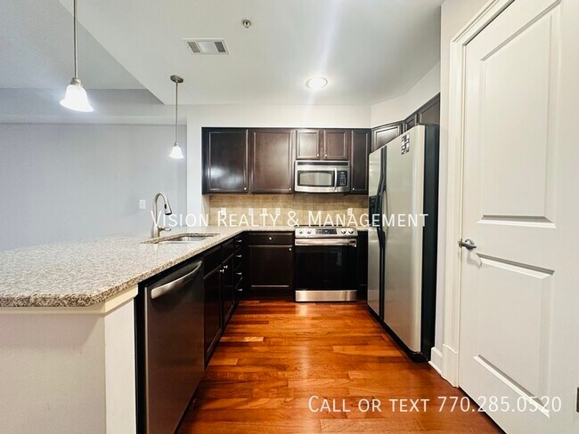 Building Photo - One BR Condo in One River Place Sandy Spri...
