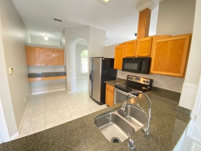 Photo - Available Now! 3/2 Home Near Hunter's Creek and OIA