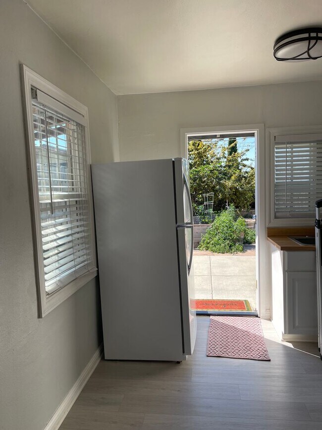 Building Photo - Cozy Home with Fully Equipped RV Space