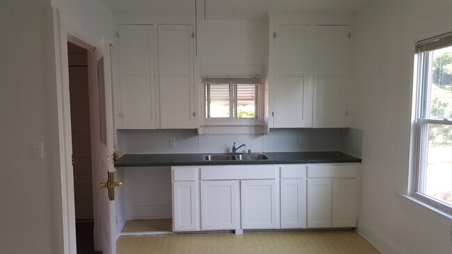 Main entrance enters into Kitchen - 3127 W 38th St