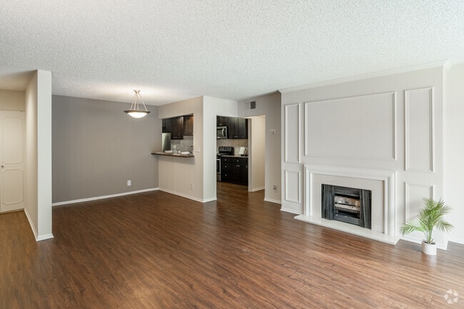 2BR, 2BA - Cannes - 1,185SF - Living Room and Dining Room - Versailles on the Lake Apartments