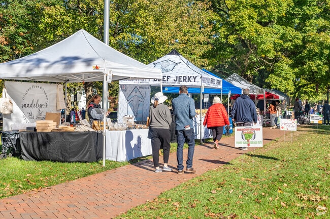 Families embrace the monthly farmers market for its friendly atmosphere and direct connection to farm-to-table products.