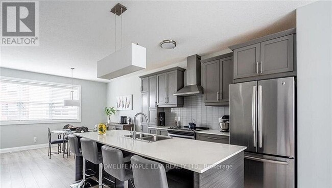 Photo du bâtiment - 3025-3025 Singleton Ave