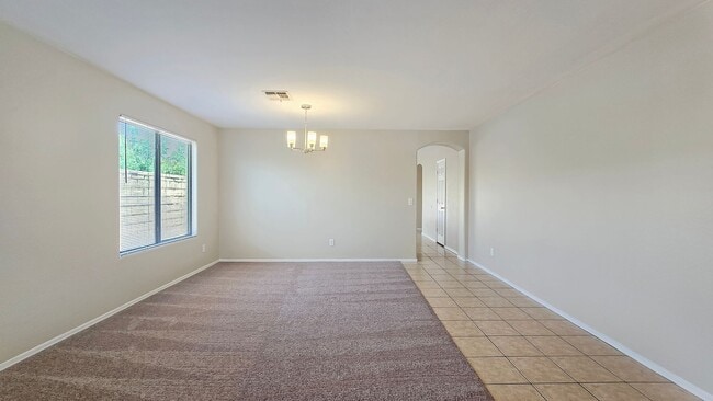 Building Photo - Excellent Corner Lot Home!  Mostly tile fl...