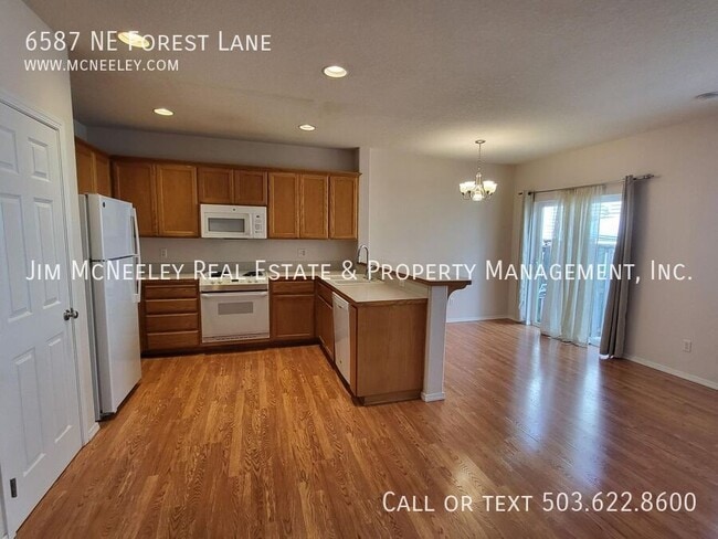 Building Photo - 6587 NE Forest Ln