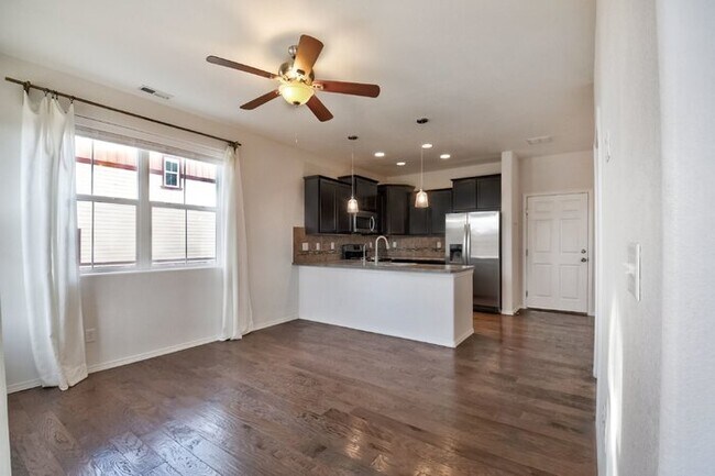 Building Photo - Immaculate 3-Bedroom Townhome with Stainless Steel Appliances and Attached Garage Near Peterson SFB
