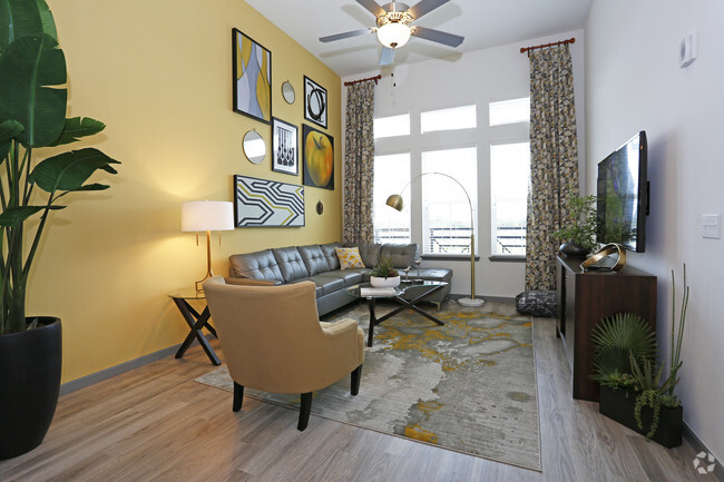 1BR, 1BA - 837 SF - The Cove - Living - The Addison on Long Bayou