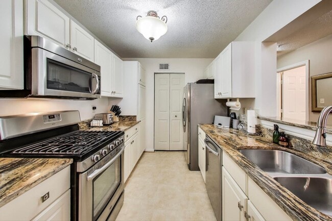Photo - Beautifully updated and maintained 2 level... Apartment