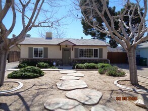 Building Photo - 5244 Ave L 2