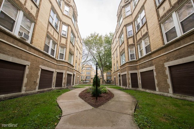 Foto del edificio - 2 br, 1 bath Apartment - 7806 S Essex Ave