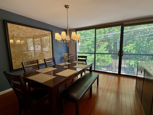 Kitchen and Dining Room Enjoy Wall-to-Wall Windows. - 960 N Pennsylvania St