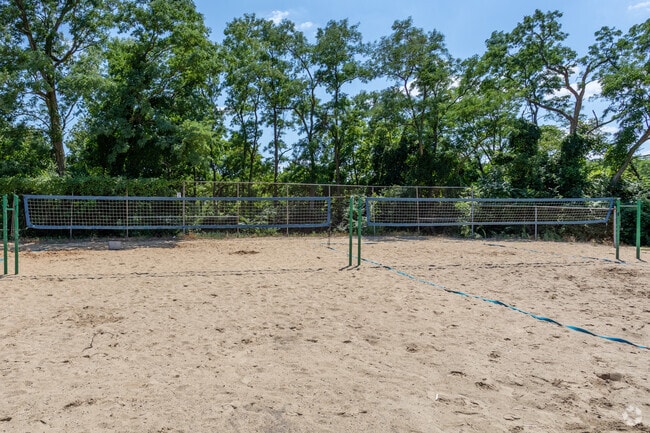 Sand volleyball courts at the Dunham Recreation Center in Westwood are used during the summer.