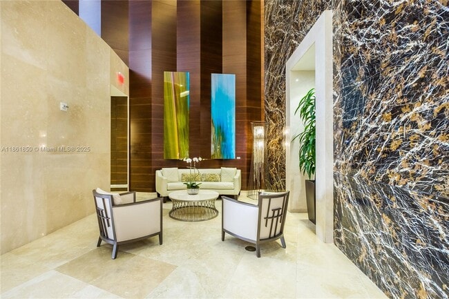 Building Photo - 15811 Collins Ave