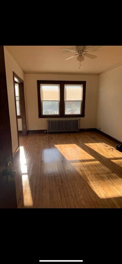 Living room/bedroom area - 19035 Old Detroit Rd
