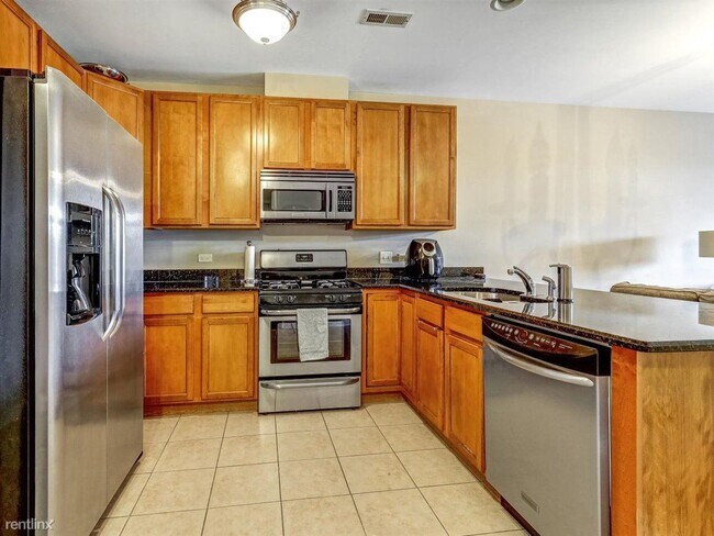 Foto del edificio - 1 br, 1 bath Condo - 6436 Roosevelt Rd