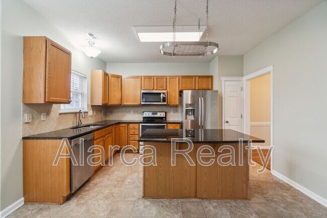 Foto del edificio - 4207 Poplar Grove Dr