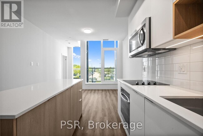 Photo du bâtiment - 4235-4235 Confederation Pkwy