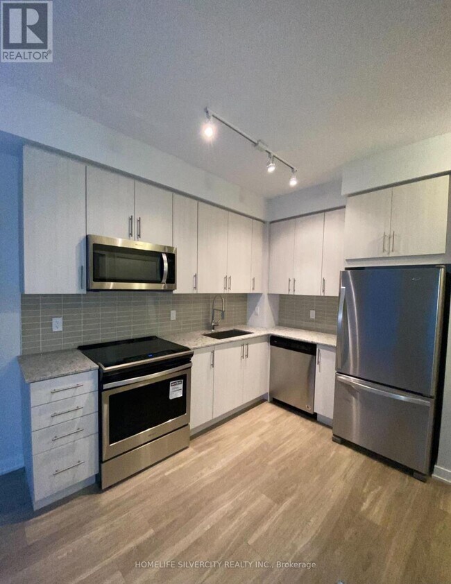 Photo du bâtiment - 4085-4085 Parkside Village Dr