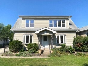Building Photo - 4916 S Lorel Ave