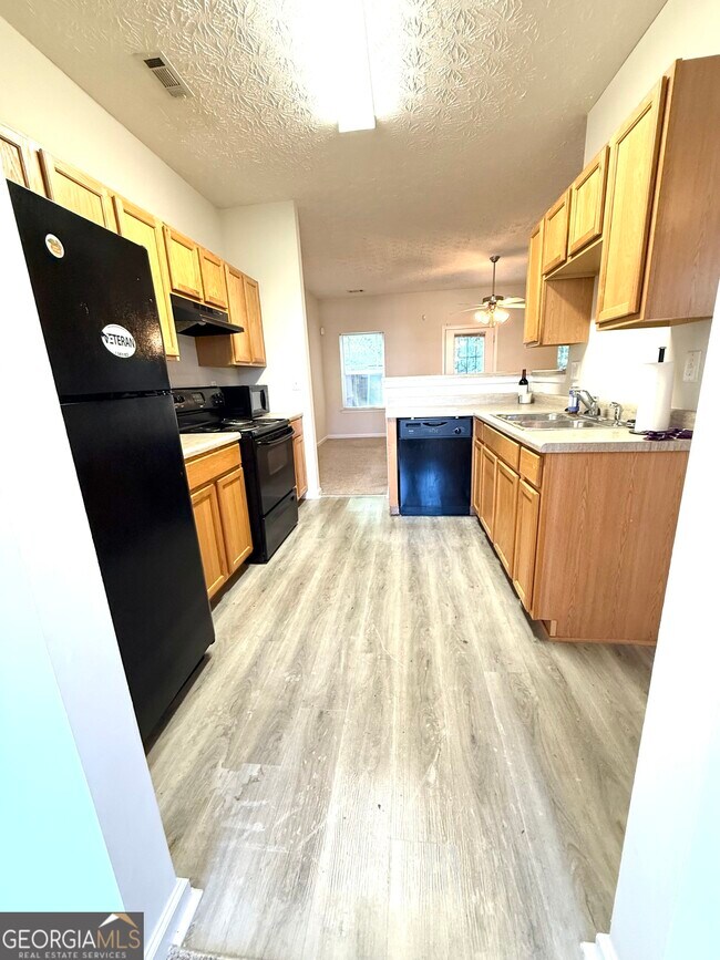 Foto del edificio - 6327 Ellenwood Dr