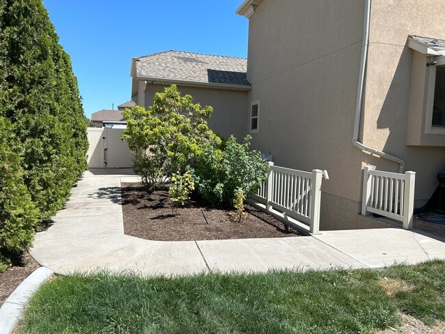 Access via a side fence from your driveway parking spot - 5939 W Birch Water Ln