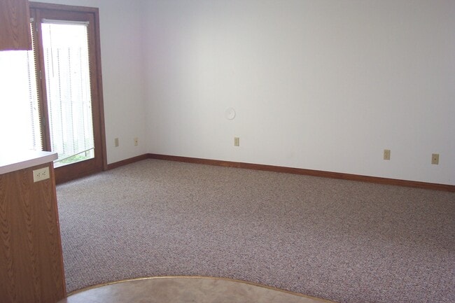 Building Photo - Tomah Property Management North