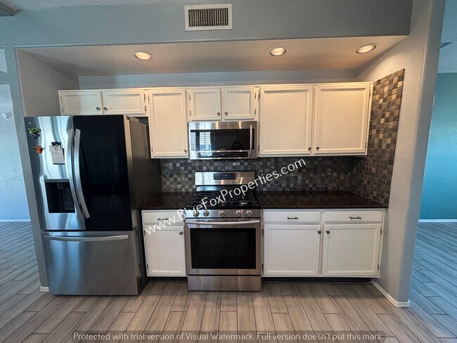 Foto del edificio - 7180 W Maple Ridge Dr