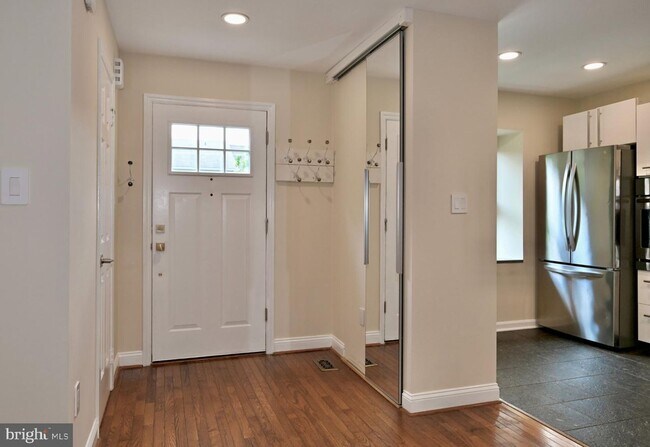 Building Photo - Discover an exquisite opportunity to lease a stunning end-of-row townhouse in the prestigious Bet...